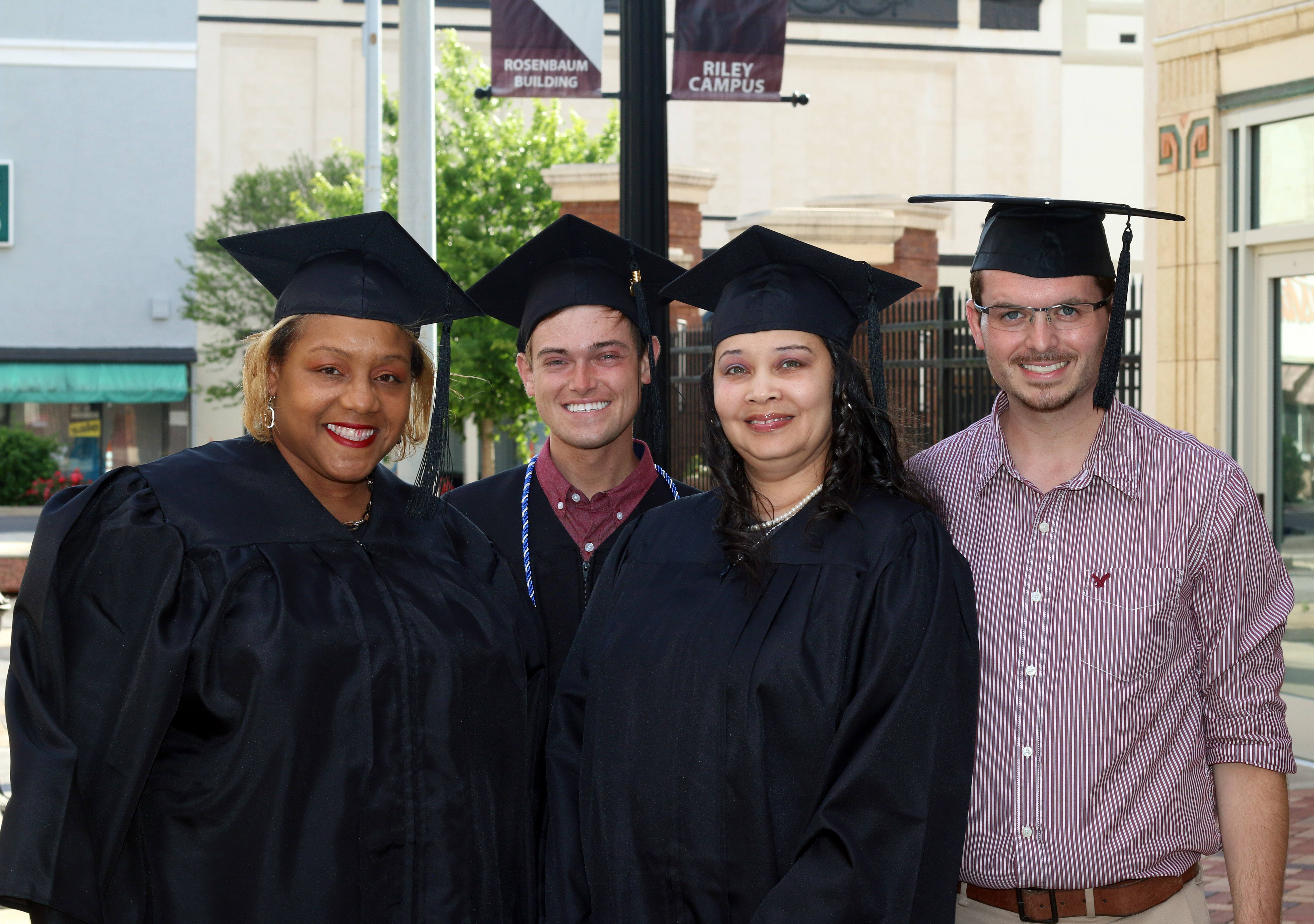 Spring 2020 graduates Margaretta Campbell, Robert "Trey" Long, DLana Griffin and Steven Miller posed for a photo before their virtual commencement held this spring May 1 (Photo by Lisa Sollie)