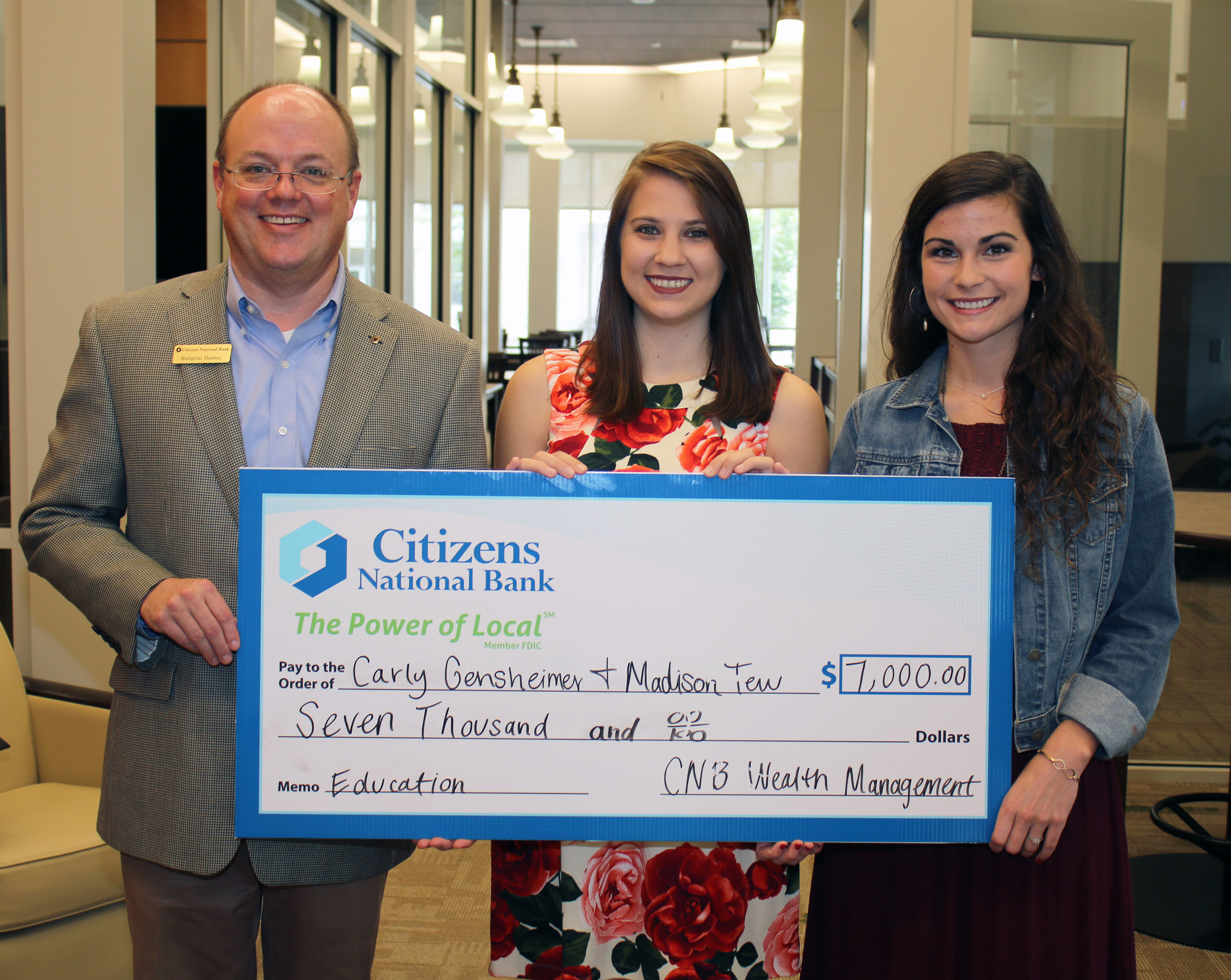 President of Citizens National Bank, Hampton Thames; MSU-Meridian students Carly Gensheimer (middle), a communication major from Union, and Madison Tew, an elementary education major from Meridian. (Photo by Lisa Sollie)