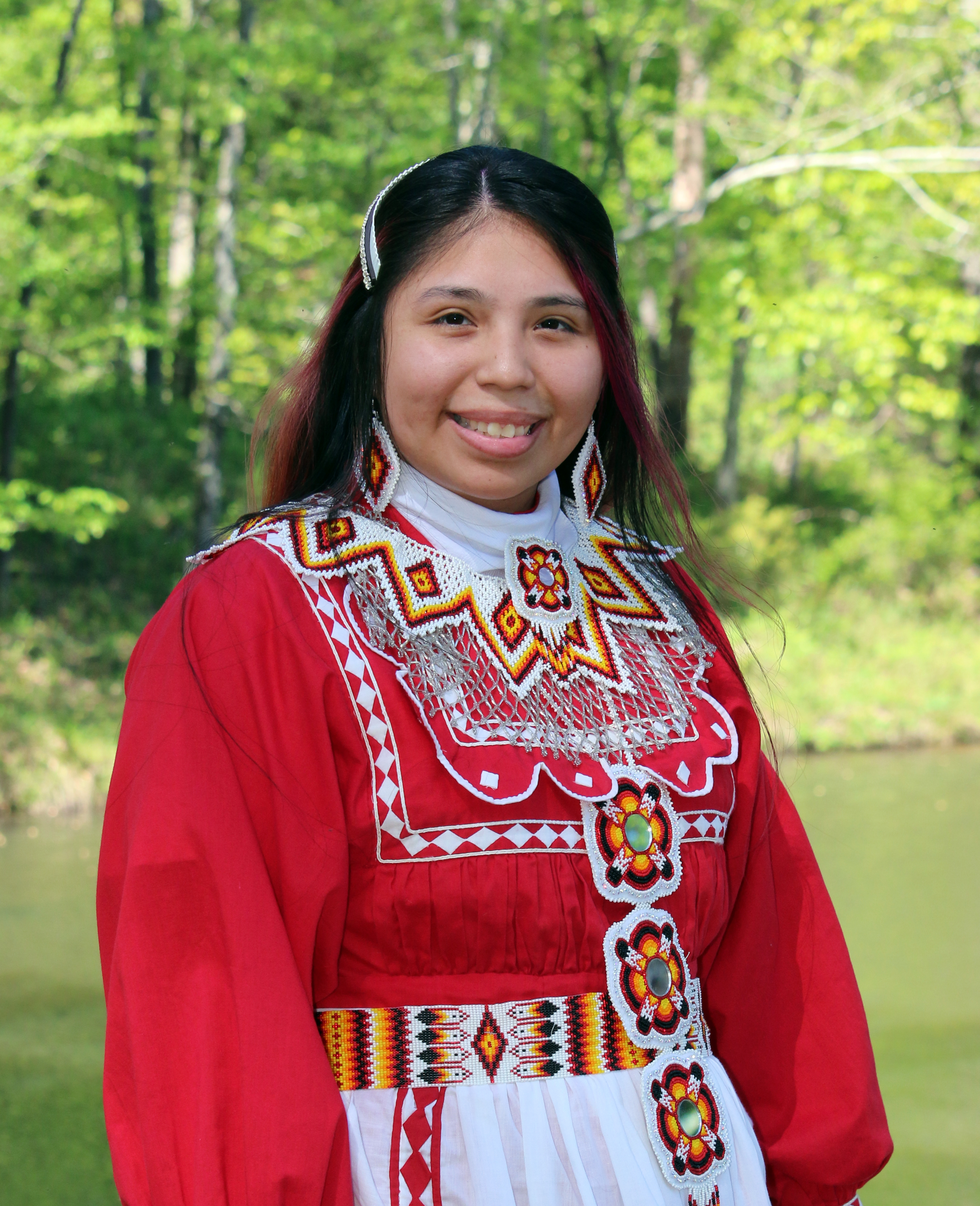Young Native American woman in traditional Choctaw attire