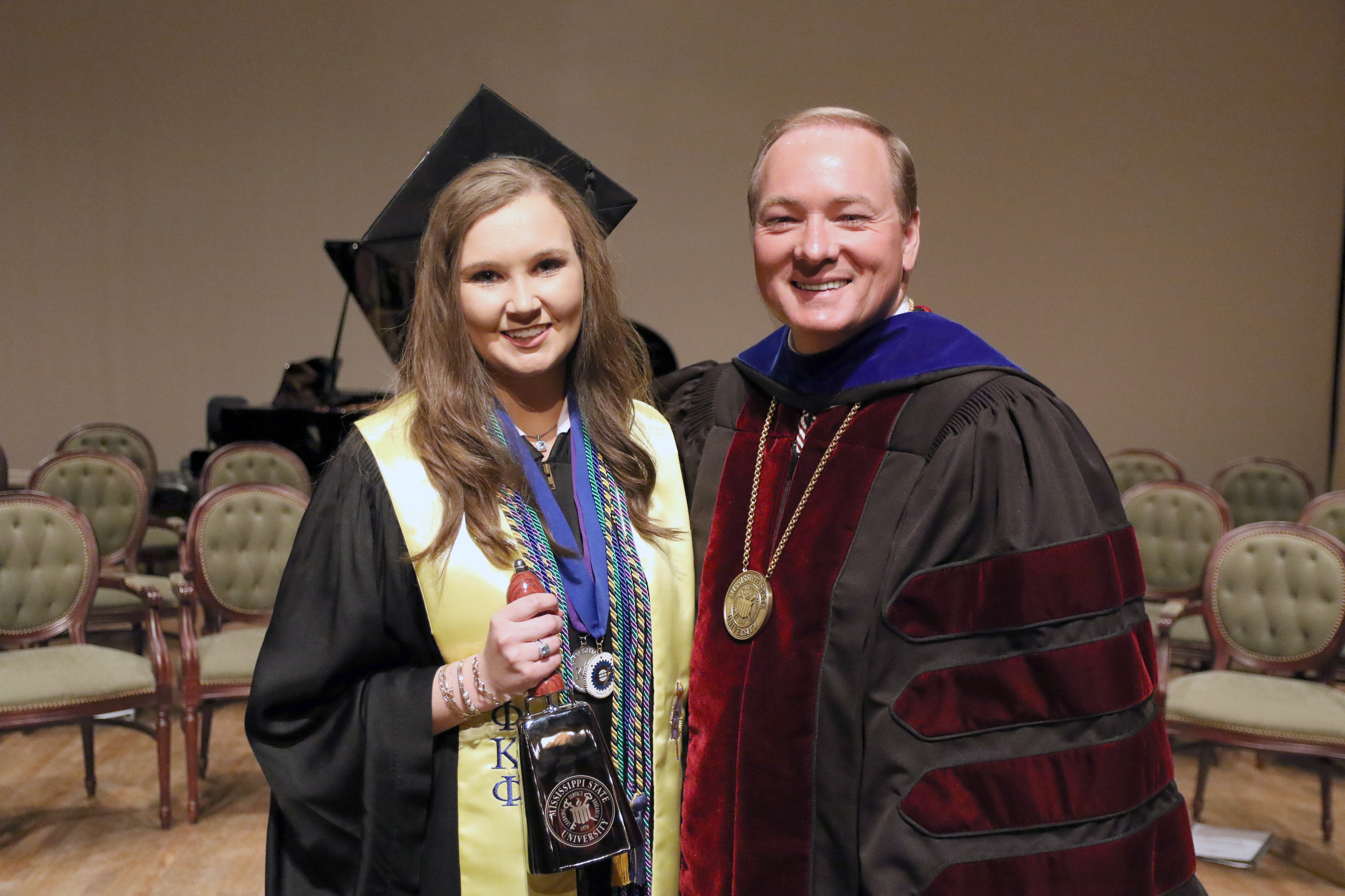As a Stephen D. Lee Scholar, Katie Gilmore was presented a chrome cowbell from MSU President Mark E. Keenum at MSU-Meridian’s 2019 spring commencement ceremony May 2. (Photo by Jason Dyess)