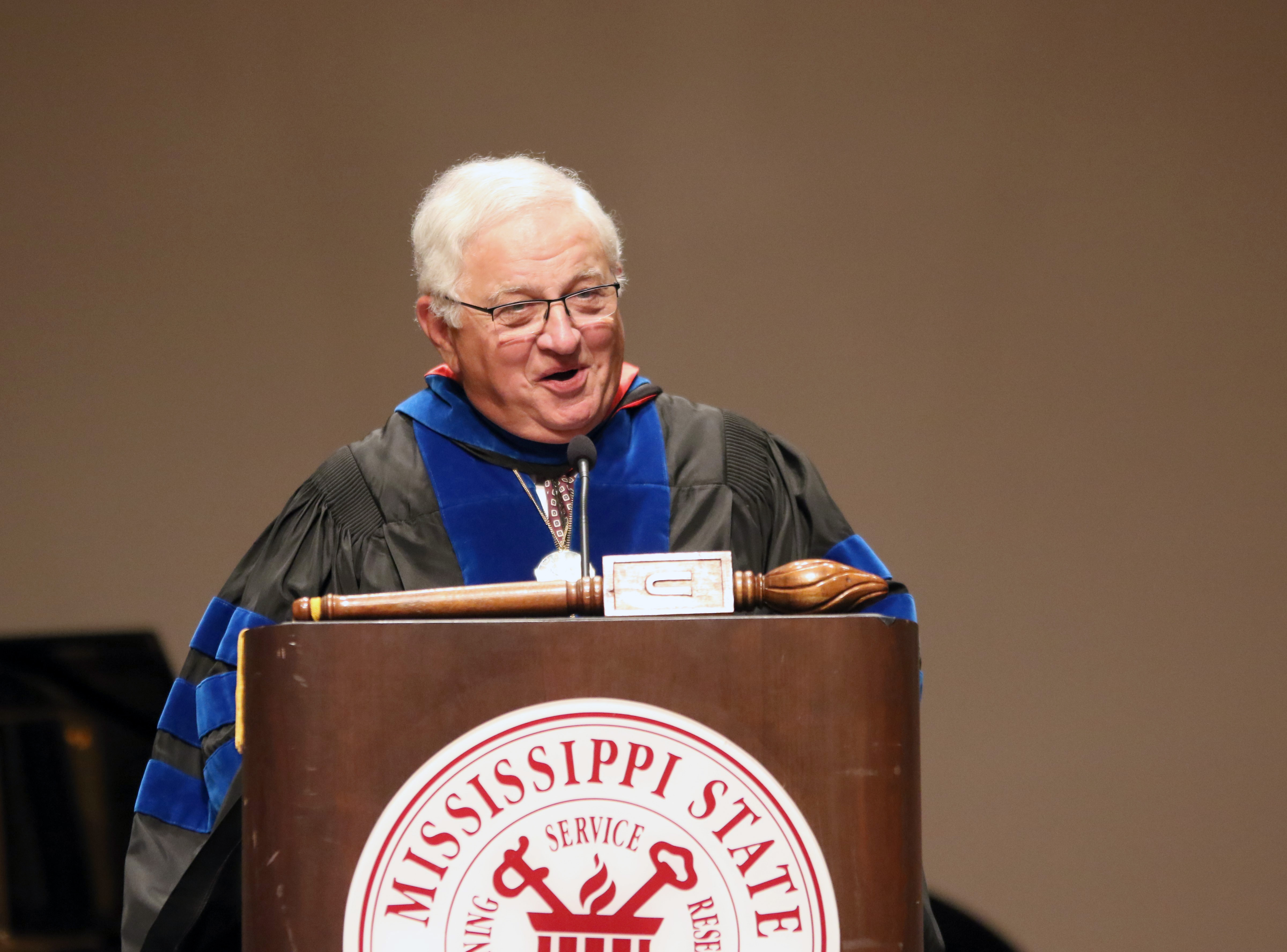 Malcolm Portera, 16th president of Mississippi State University addresses the overflow crowd at MSU-Meridian’s 2019 spring commencement ceremonies held at the MSU Riley Center in downtown Meridian. (Photo by Jason Dyess)