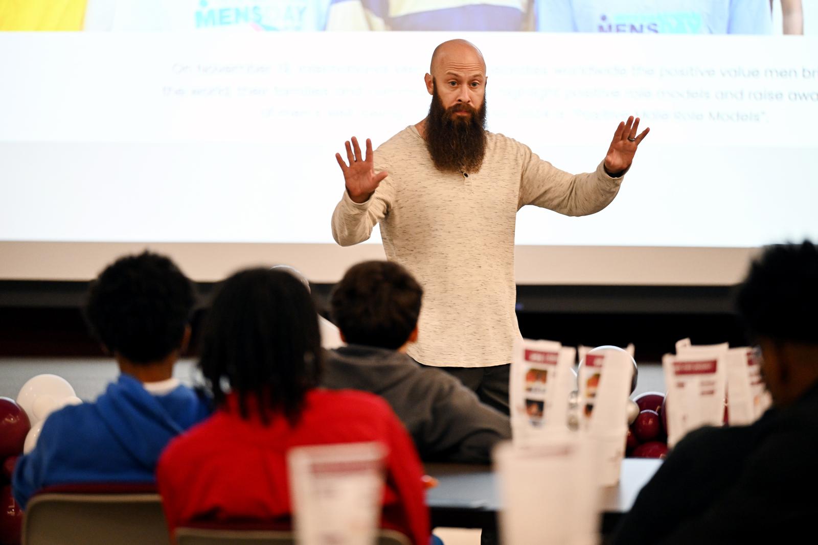 Licensed Counseling Professional James Murphy, who also serves as a crisis counselor with Meridian High School, speaks to students at MSU-Meridian’s International Men’s Day event. Murphy talked about the value of being a role model for others. (Photo by Marianne Todd)