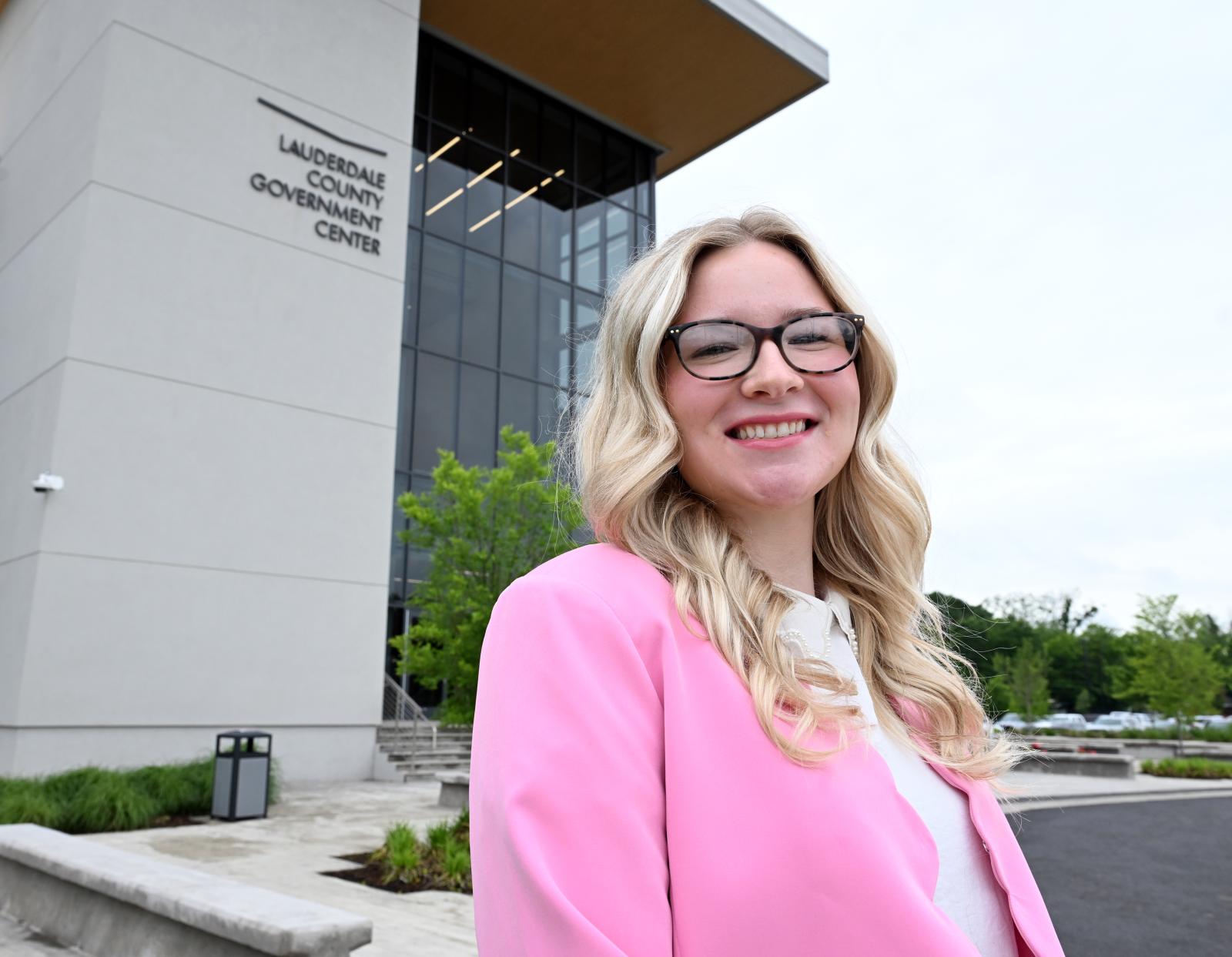 MSU PHOTO ID: Ginger Long stands outside the Lauderdale County Government Center, where she learned about night court during training through MSU’s Bulldog Experience, the university’s Quality Enhancement Plan. (Photograph by Marianne Todd)