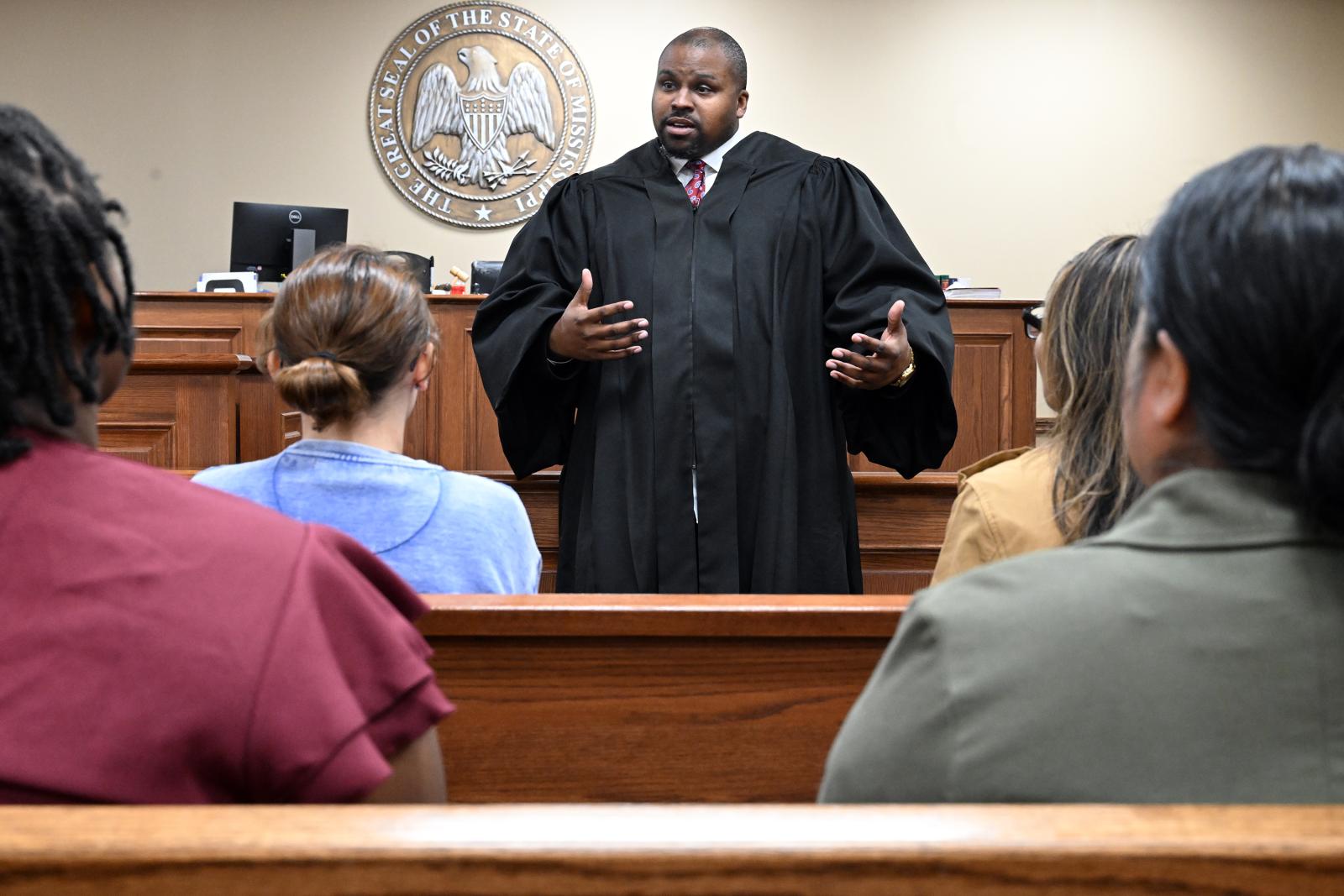 MSU PHOTO ID: Meridian municipal Judge K. Dustin Markham takes a break during night court to answer questions for criminology and social work students. (Photo by Marianne Todd)